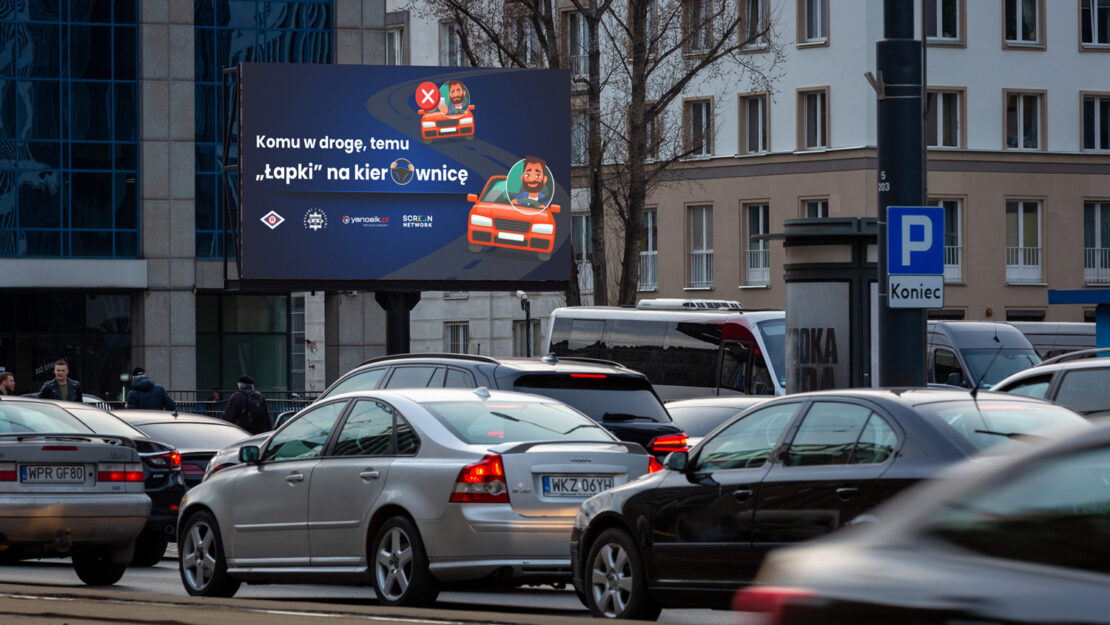 Lapki na-kierownice Policja Yanosik Screen Network apeluja na telebimach w calej Polsce